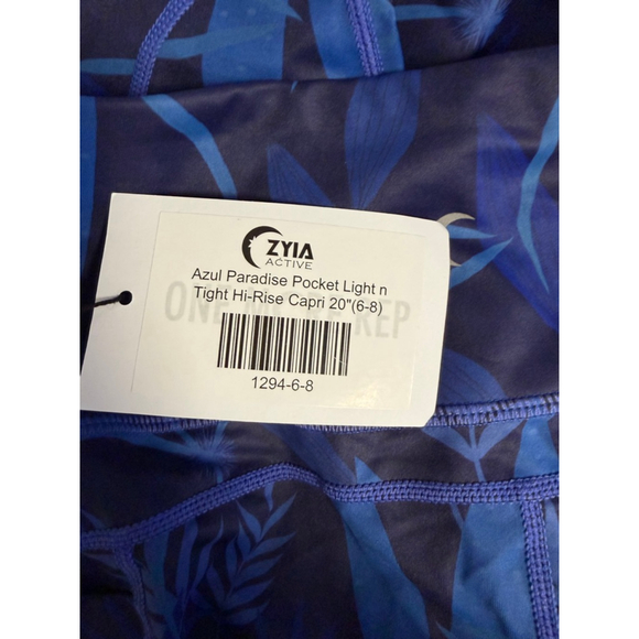 Women's ZYIA ACTIVE Blue Navy Tropical Print Hi-Rise Capri Leggings SZ 6-8 New - Picture 13 of 16